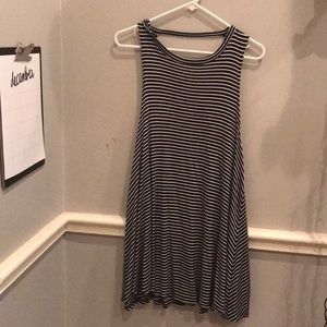 Black and white striped tunic. Revealing back.